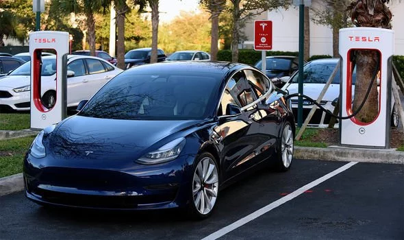 The Tesla Model 3 can achieve around 325-miles on a charge (Image: GETTY)