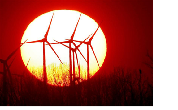 Wind turbines turn in front of the setting sun in Biebesheim, some 50 km south of Frankfurt, Germany, Tuesday, Feb. 27, 2018.(AP Photo/Michael Probst) ASSOCIATED PRESS