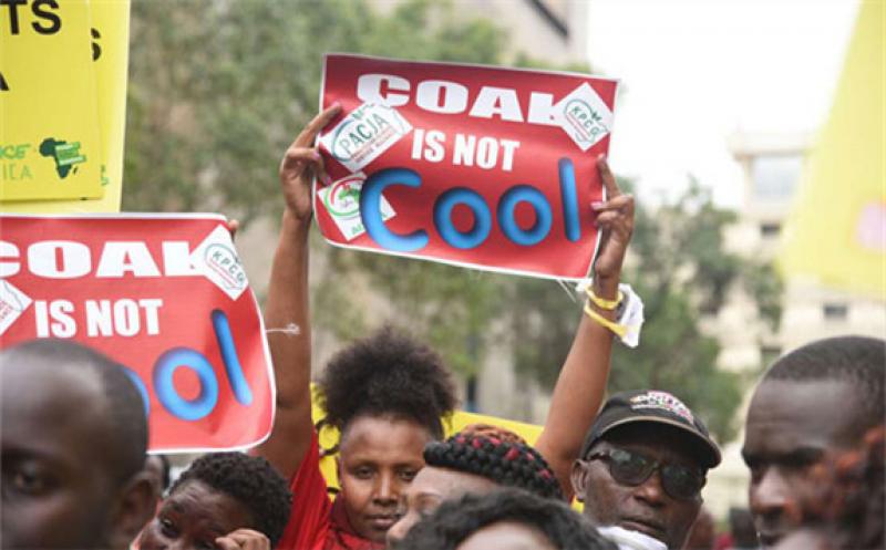 Protesters express disapproval for the Lamu coal plant project during a Greenpeace and environmental activists' demonstration in Nairobi County on June 12, 2019. PHOTO | EVANS HABIL | NATION MEDIA GROUP 