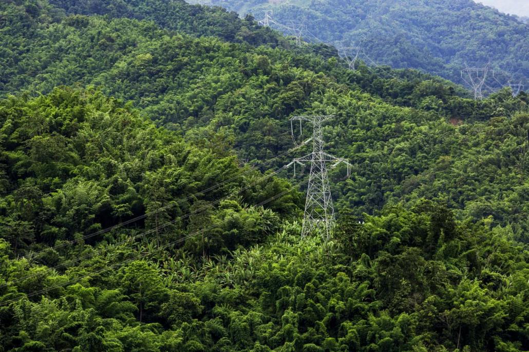 Transmission towers on the China side of the Darpein dam. (Hkun Lat | Frontier)