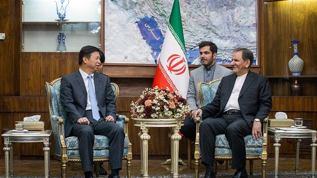 Head of the Communist Party’s International Department Song Tao (L) holds talks with Iran's Vice President Es’haq Jahangiri (R) in Tehran, July 29, 2019. (Photo by Fars)