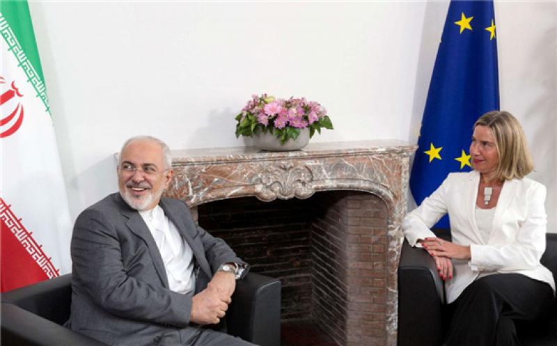 Iran's Foreign Minister Mohammad Javad Zarif attends a meeting with European Union foreign policy chief Federica Mogherini