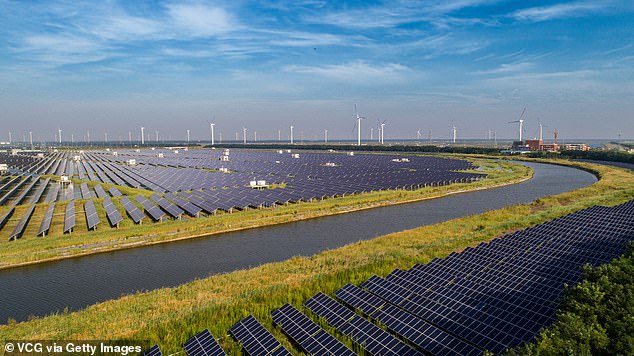 'In recent years, China has become not just a large producer but a major market for solar photovoltaics,' the researchers wrote in their paper. Pictured, China's Wanjiashan Photovoltaic Power Station in Sichuan Province, seen here in 2014 just before its completion