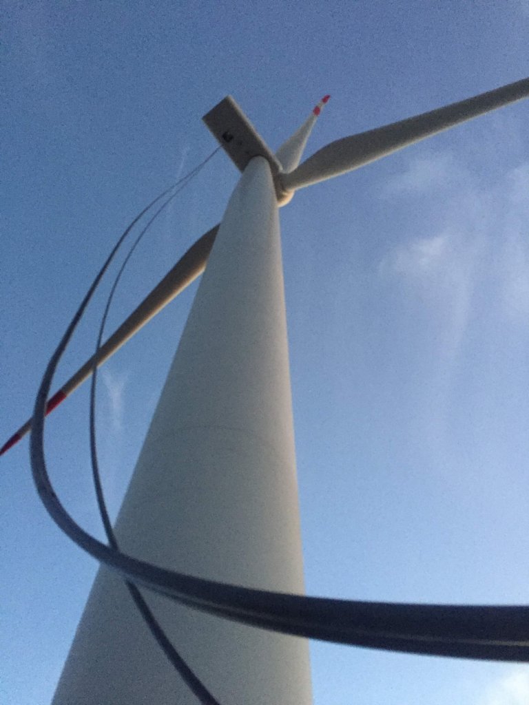 A special hose is used to move oil safely up or down a wind-turbine tower for oil drains or refills in the gearbox.