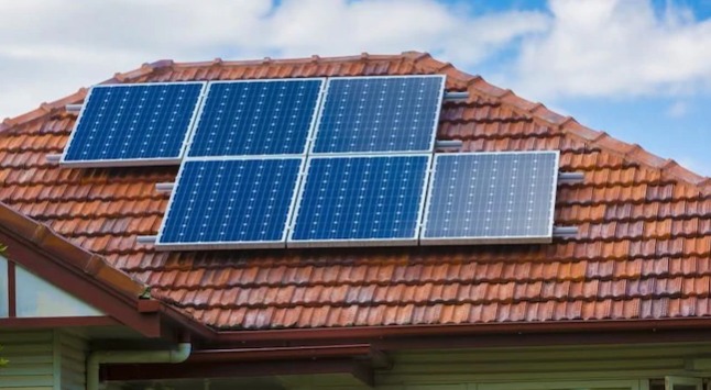 Up to 3,000 low-income households in NSW are being offered free solar panels of their rooftops. Credit: AAP
