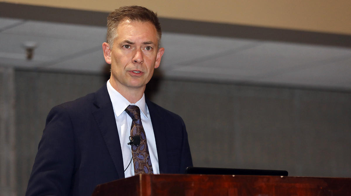 Kenworth's Kevin Baney addresses the media. (John Sommers II for Transport Topics)