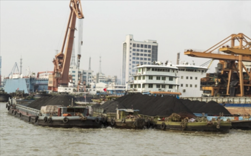 Cargo ships loaded with rare earth soil for export in China. (Image courtesy of Shutterstock)