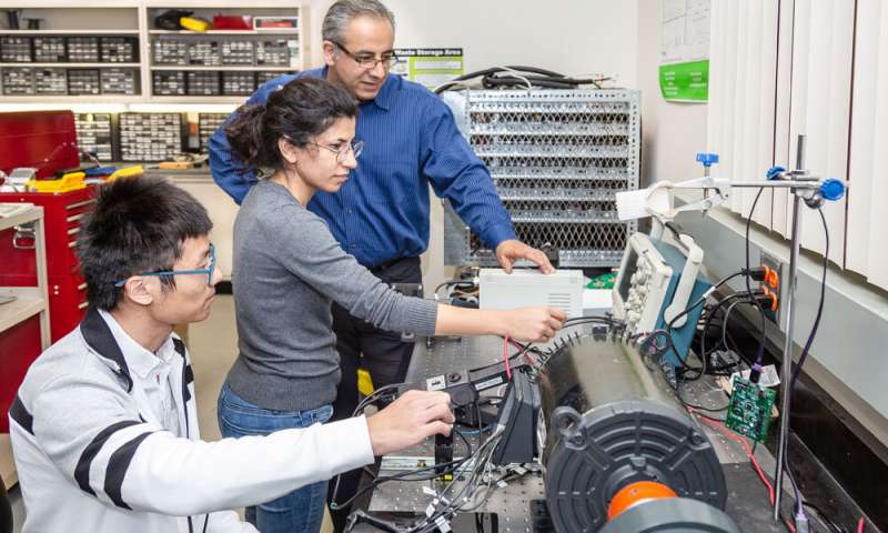 From left: Electrical engineering doctoral students Tianyu Chen and Mahshid Khoshlessan, and Dr. Babak Fahimi, Distinguished Chair in Engineering and professor of electrical engineering, monitor the performance of a smart variable speed motor, which can follow commands wirelessly.