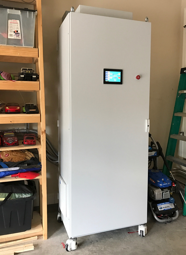 Microgrid in a Box: The Energy Switch combines 5,500 watts of energy storage with circuits that limit the power draw from the grid and also correct for distortion produced by appliances and electronics in the home. The system also manages power from rooftop solar and backup generators when needed.