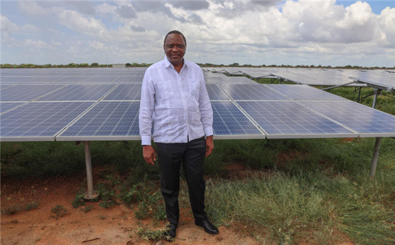 President Uhuru Kenyatta at the 50mw solar power plant in Garissa, yesterday.