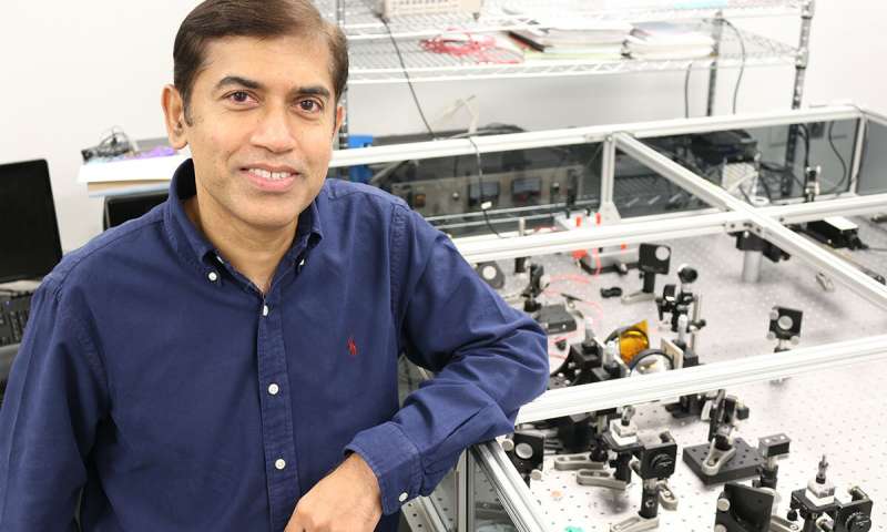 UCF's Jayan Thomas led the team in reviewing more than 2,000 peer-reviewed publications about perovskites and collecting more than 300 data points that were fed into the AI system the team created. The system was able to analyze the information and predict which perovskites recipe would work best. Credit: UCF, Karen Norum