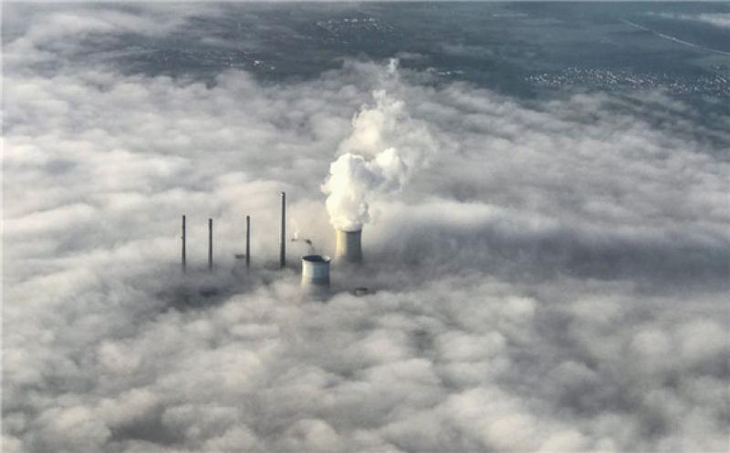 The cooling towers of the Staudinger coal-powered power plant in Grosskrotzenburg near Frankfurt on April 29. PHOTO: ARMANDO BABANI/SHUTTERSTOCK