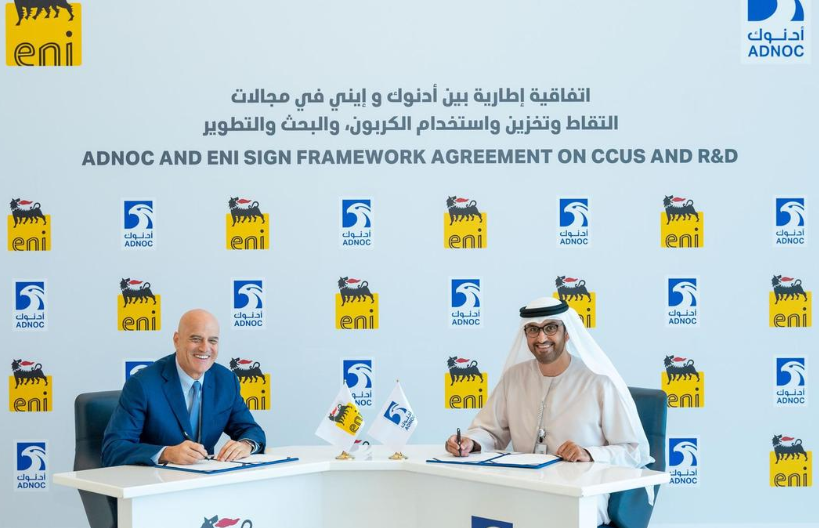 Eni chief executive Claudio Descalzi signs the agreement with UAE Minister of State and Adnoc group chief executive Dr Sultan Al Jaber, Image courtesy of Adnoc