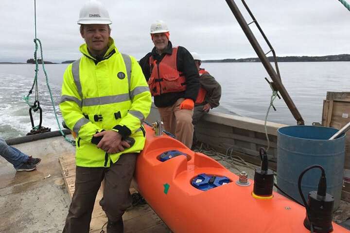 Levi Kilcher and Bob Lewis prepare to launch the StableWing ocean-turbulence measurement platform in the Western Passage of Maine.
