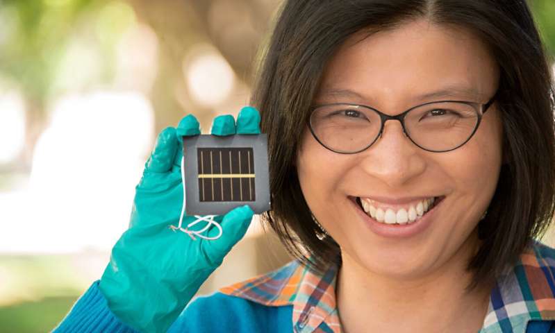 Professor Anita Ho-Baillie with an earlier prototype perovskite solar cell. Credit: UNSW