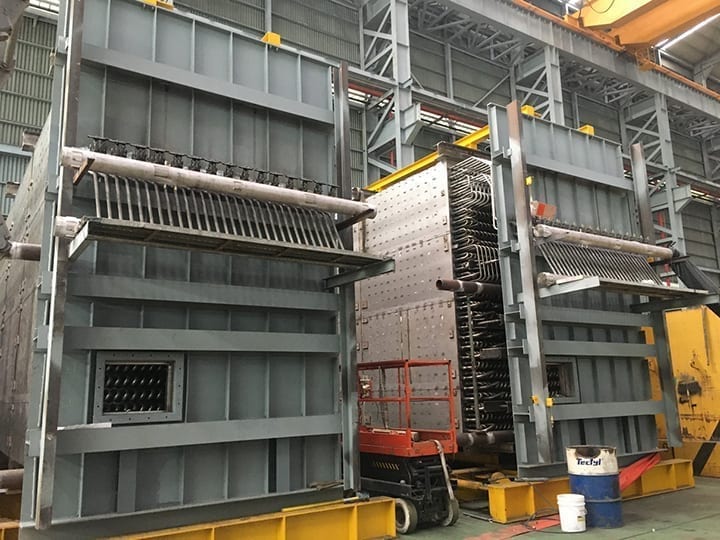 2. Fabrication of a typical vertical OTB module nears completion. The width of a single module is about 4.5 meters for shipping considerations. Note how tube sheets support the individual tubes. The modular nature of the OTB permits a very straightforward assembly sequence. Courtesy: John Cockerill Energy
