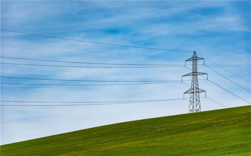 GridLiance currently owns and operates more than 700 miles of power transmission lines. Credit: Thomas Despeyroux on Unsplash.