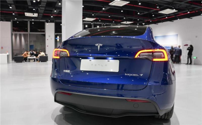 A Tesla Model Y vehicle is pictured at a Tesla Center in east China's Shanghai, Jan. 18, 2021. U.S. electric carmaker Tesla Inc. on Monday began Shanghai deliveries of its built-in-China Model Y. On Jan. 7, 2020, Tesla launched the project to manufacture Model Y vehicles in its Shanghai Gigafactory, its first overseas plant outside the United States. The China-made model went on sale on Jan. 1. (Xinhua/Ding Ting)
