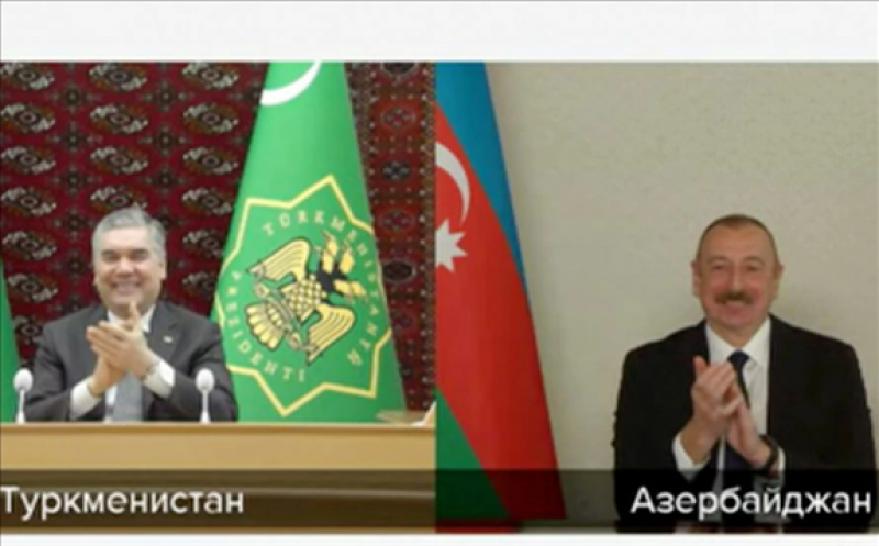 Azerbaijani President Ilham Aliyev (right) and Turkmen President Gurbanguly Berdymukhammedov supervised an online signing of the agreement on January 21.