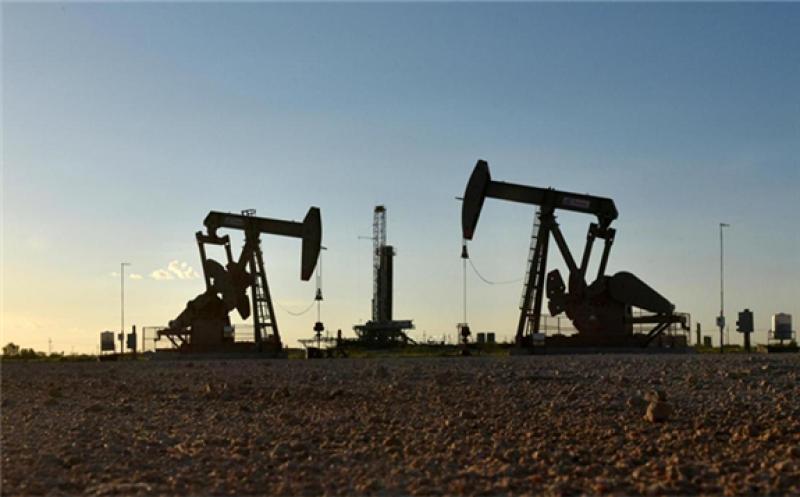 Pump jacks operate in an oil field in Texas US. Global oil demand is expected to return to pre-coronavirus levels by 2023, according to the Economist Intelligence Unit