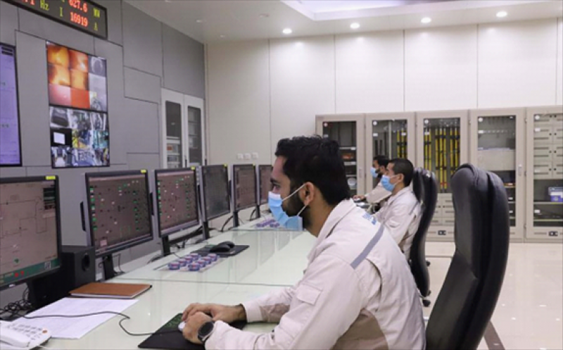 Engineers work in the central control room of Sahiwal coal-fired power plant in Sahiwal, Pakistan, Jan. 24, 2021. (Xinhua/Li Hao)