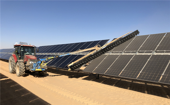 Picture 2: A SunBrush® mobil Compact removes sand from solar modules at the Benban solar park.