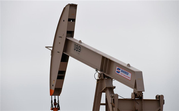 A pump jack operates in the Permian Basin oil and natural gas production area near Odessa, Texas. Reuters