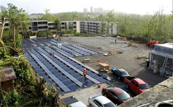 A solar-plus-storage project at a hospital in Puerto Rico, built after the devastation from hurricanes in 2017 knocked out a huge proportion of the island territory's electricity network. Image: Tesla / Twitter.