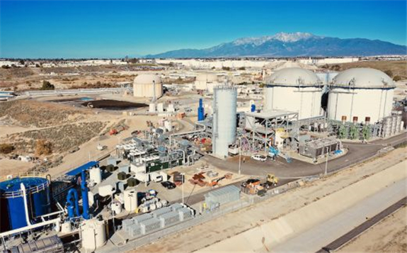 Rialto Bioenergy Facility in San Bernadino County, California, with artist rendering of Redflow Energy Pod zinc-bromine battery units in lower foreground. Image: Redflow.