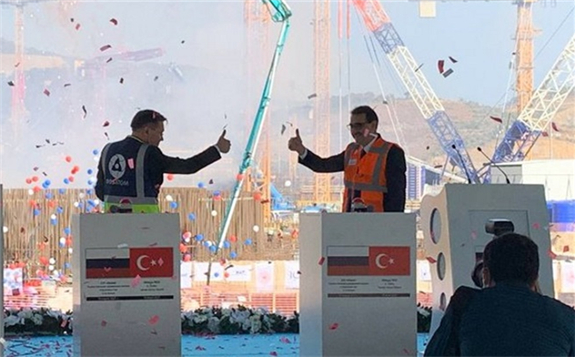 Rosatom announced today that first concrete has been poured for the third unit of the Akkuyu nuclear power plant under construction in the Mersin province of Turkey. The Russian and Turkish heads of state joined the ceremony held to mark the event by video link. The Akkuyu nuclear power plant project is based on an intergovernmental agreement the two countries signed in 2010.  Turkish Energy and Natural Resources Minister Fatih Dönmez and Rosatom Director General Alexey Likhachov launching construction at Akkuyu unit 3 today (Image: Rosatom Global)  