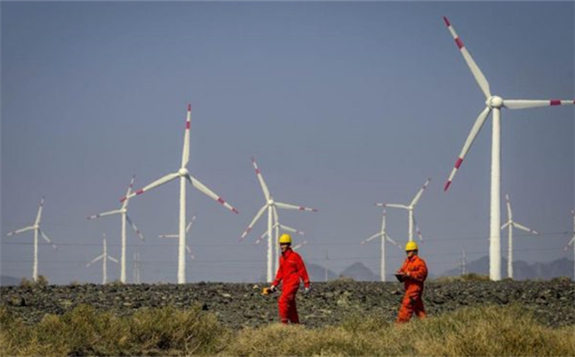 Workers check equipment at a wind power plant in Urumqi, northwest China’s Xinjiang Uygur Autonomous Region. File photo: Xinhua