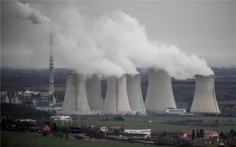 Steam escape from the chimneys of the 1000 megawatt coal-fired power plant Pocerady near Most, Czech Republic. EPA-EFE/MARTIN DIVISEK/FILE PICTURE