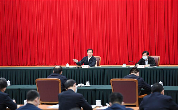 Chinese Vice Premier Han Zheng, also a member of the Standing Committee of the Political Bureau of the Communist Party of China Central Committee, attends a symposium at the National Development and Reform Commission in Beijing, capital of China, March 16, 2021. (Xinhua/Yin Bogu)