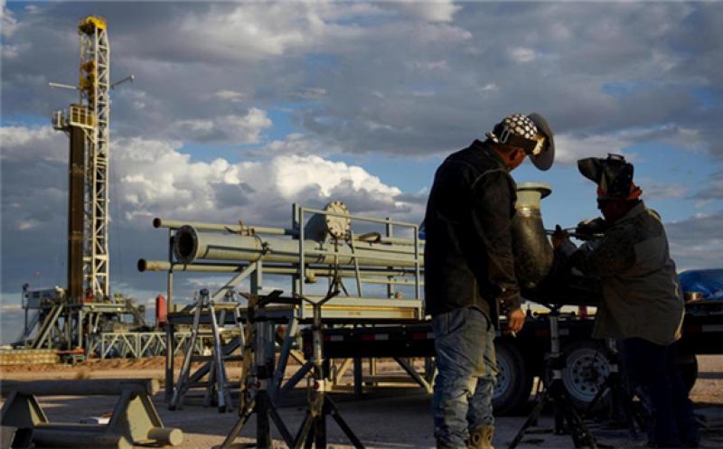Workers at a Colgate Energy site in Texas. Brent and WTI have gained 30% since the beginning of the year, when news of vaccine distribution and a weak dollar moved the needle on prices. Bloomberg