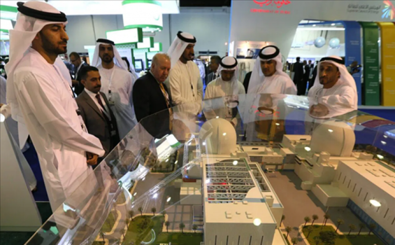 Visitors look at the Emirates Nuclear Energy Corporation presentation, during the opening the World Energy Forum 2012, at the Exhibition Centre, in Dubai, on October 22, 2012 [KARIM SAHIB/AFP via Getty Images]