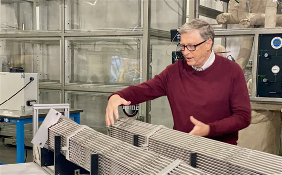 Bill Gates at TerraPower with with a mock-up of metal fuel pin bundles.Photo courtesy Gates Notes