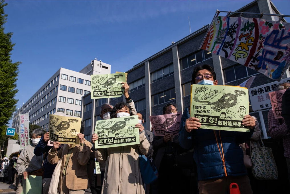 Demonstrators outside of the prime minister’s office a day before the decision was announced. Disposal of the wastewater has been long delayed by public opposition and safety concerns.Credit...Takashi Aoyama/Getty Images