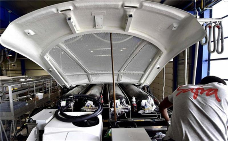 A technician works on the hydrogen tank of an under construction hydrogen bus in southwestern France. Hydrogen, an alternative fuel has risen in prominence in several markets around the world. AFP 