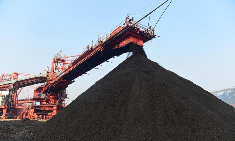Photo taken on Dec. 22, 2020 shows a thermal coal yard of Huanghua Port in Cangzhou City, north China's Hebei Province. Huanghua Port, one of the key ports for thermal coal transportation in China. (Xinhua/Wang Min)