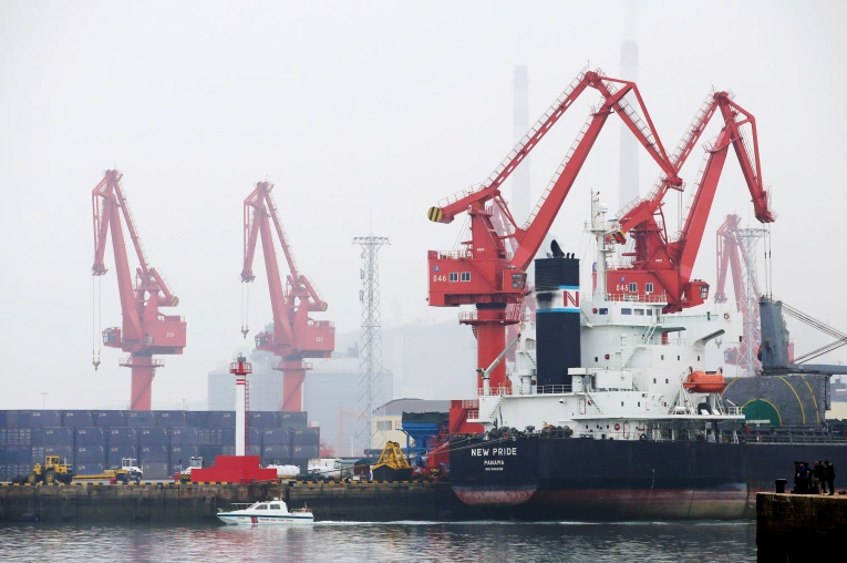 The spill could threaten operations at Qingdao port in China's Shandong province, the biggest crude-receiving terminal for the world’s largest importer, and a hub for oil refiners that account for about a quarter of China’s total processing capacity [File: Jason Lee/Reuters]