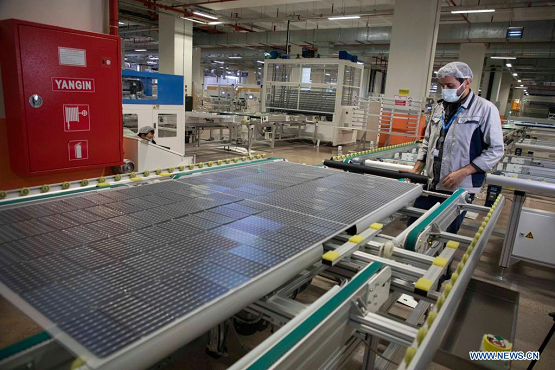 An Employee works in the factory of HT Solar Energy in Istanbul, Turkey, on May 7, 2021. Turkey and China are mutually benefiting from each other's advantages in the field of solar panel production. (Photo by Osman Orsal/Xinhua)
