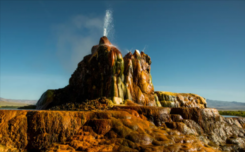 The Fly Geyser in Nevada is heated by hot rock deep below the surface.  Getty Images