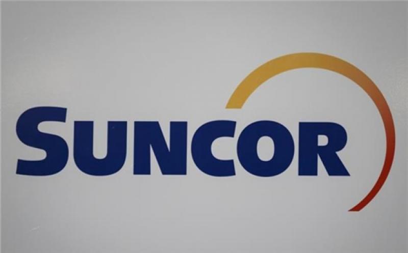 A Suncor logo is shown at the company's annual meeting in Calgary, Thursday, May 2, 2019. THE CANADIAN PRESS/Jeff McIntosh