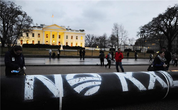 Environmental activists protest against the pipeline in front of the White House in Washington. AFP