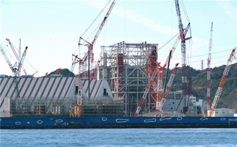 File photo taken in February 2021 shows a coal-fired power plant under construction in Yokosuka. (Kyodo)