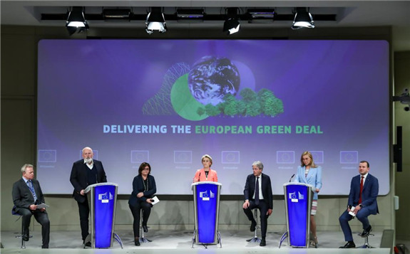 European Commission President Ursula von der Leyen (4th L) and European Commission Executive Vice-President Frans Timmermans (2nd L) attend a press conference with commissioners in Brussels, Belgium, on July 14, 2021. The European Commission on Wednesday unveiled a comprehensive roadmap for realizing the European Union's (EU) ambitious target of reducing its net greenhouse gas emissions by at least 55 percent from 1990 levels by 2030 and to become climate-neutral by 2050. (Xinhua/Zhang Cheng)