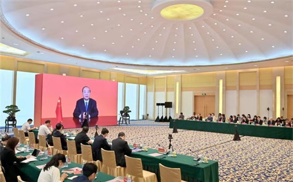 Huang Kunming, a member of the Political Bureau of the Communist Party of China (CPC) Central Committee and head of the Publicity Department of the CPC Central Committee, delivers a keynote speech via video at the opening ceremony of the second Cambodia-China Think Tank High-level Forum in Beijing, capital of China, July 28, 2021. (Xinhua/Yue Yuewei)