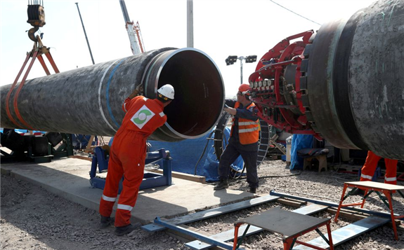 Workers are seen at the construction site of the Nord Stream 2 gas pipeline, near the town of Kingisepp, Leningrad region, Russia, June 5, 2019. REUTERS/Anton Vaganov