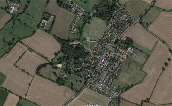 An aerial view of Swardeston, in south Norfolk. The proposed project would be located off the B1113 road, which runs diagonally through the centre of the village. - Credit: Google