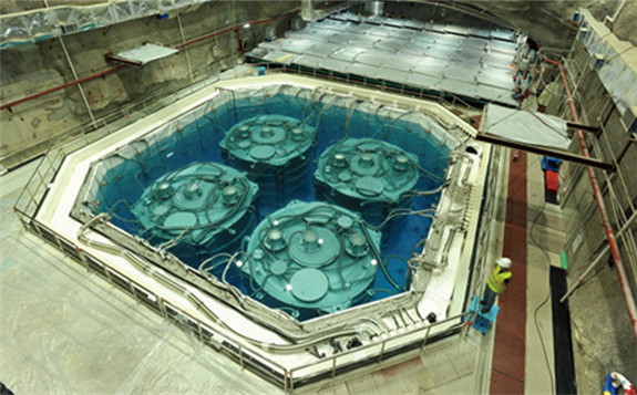 Antineutrino detectors are submerged in water pools at the site of the Daya Bay Experiment in Guangdong province, China (Image: IHEP)